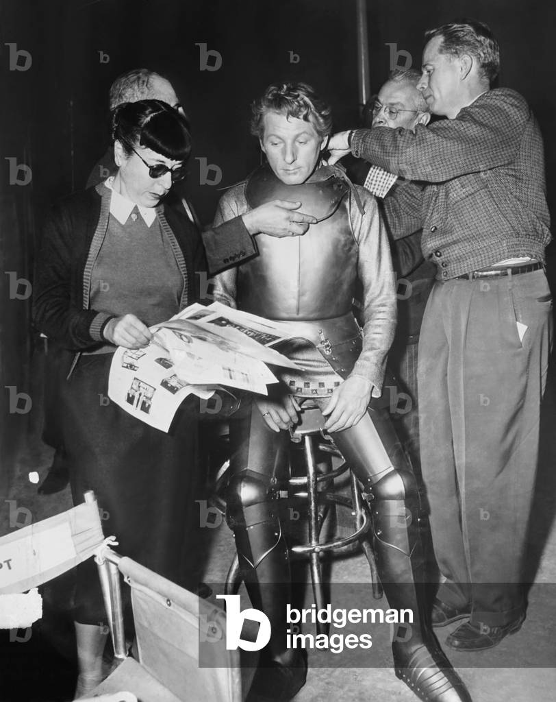 Image Of THE COURT JESTER From Left Costume Designer Supervises Teh image-of-the-court-jester-from-left-costume-designer-supervises-teh