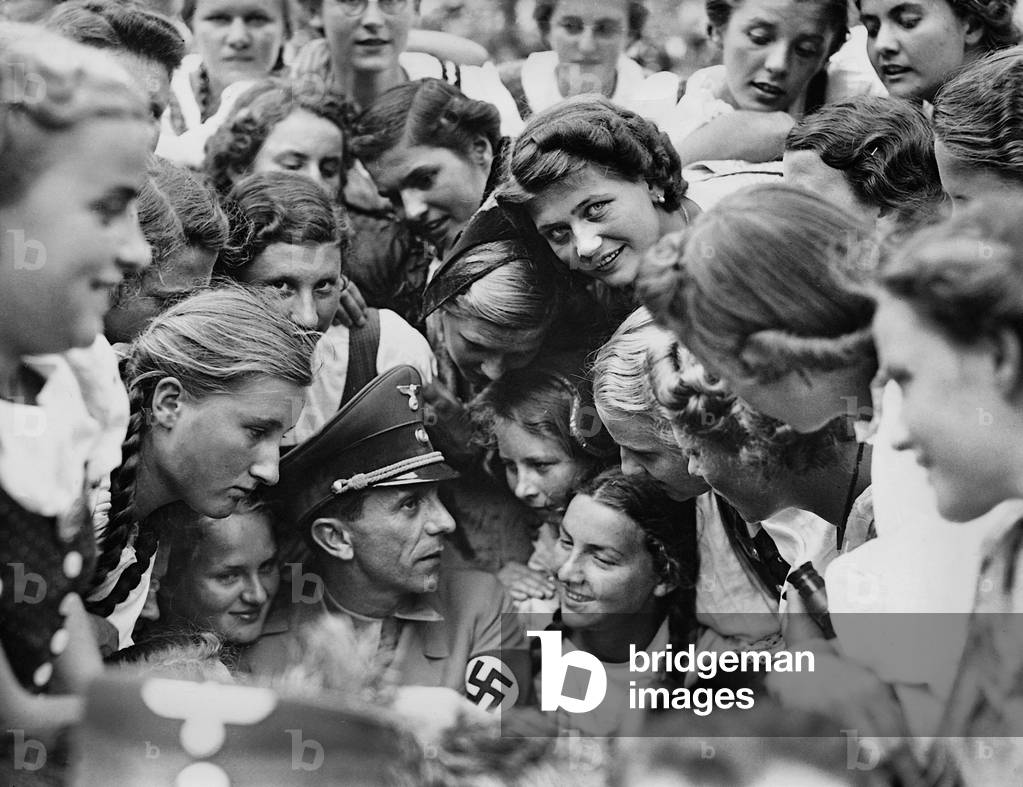Image of Joseph Goebbels surrounded by girls on the Nuremberg Rally, 1938