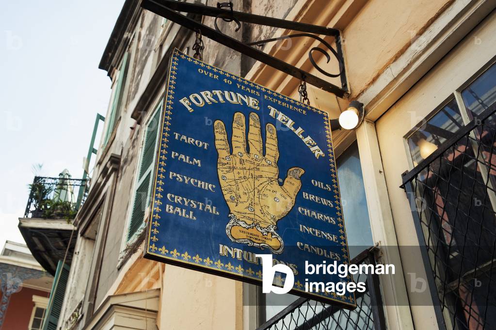 USA, Fortune teller sign in front of building, New Orleans Louisiana (photo)