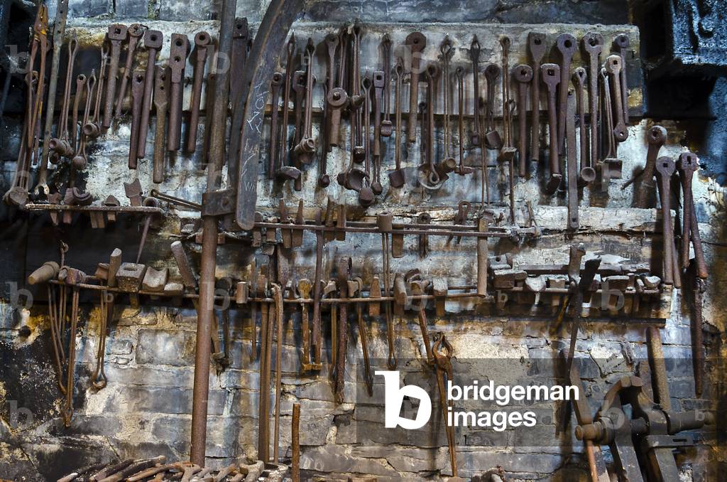 Image de Photographie représentant Outils muraux dans la Forge des anciens forgerons