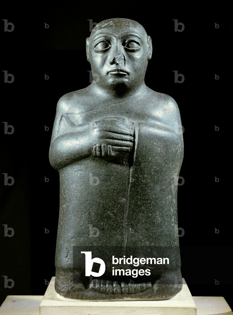 A man with folded hands …