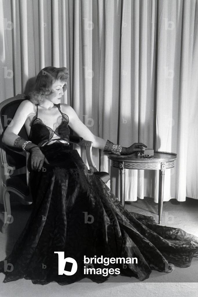 Image of Photography depicting A model trying a dress of fashion designer Hilda Romatzki