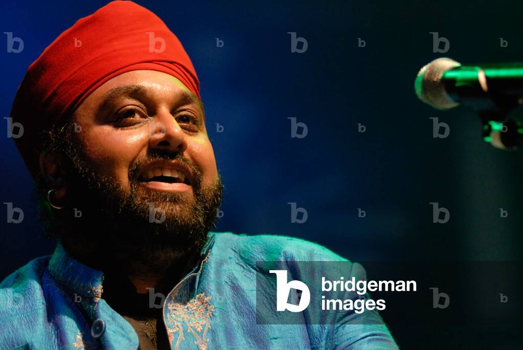 Image de Photographie représentant Buzz Singh - chanteur (photo) par Paul Tomlins