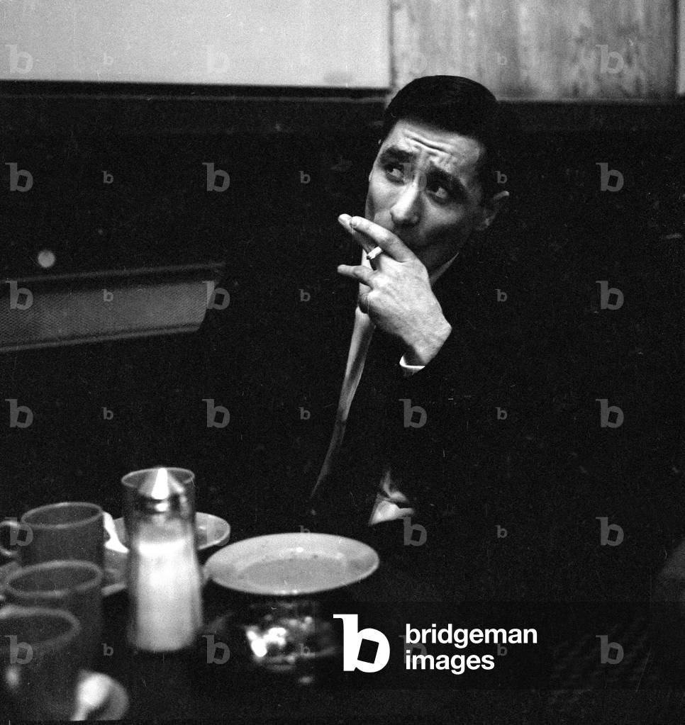Image of British gangster Dennis Stafford smoking a cigarette after his  release