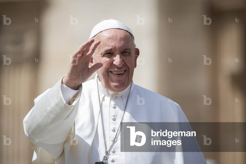 Pope Francis greets the faithful at the end of his weekly general audience in St. Peter's Square at the Vatica