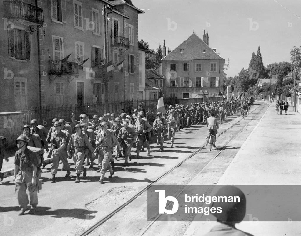 A French Unit are crossing the city of Lons-le-Saulnier in the department of Jura(39) after liberation by alli