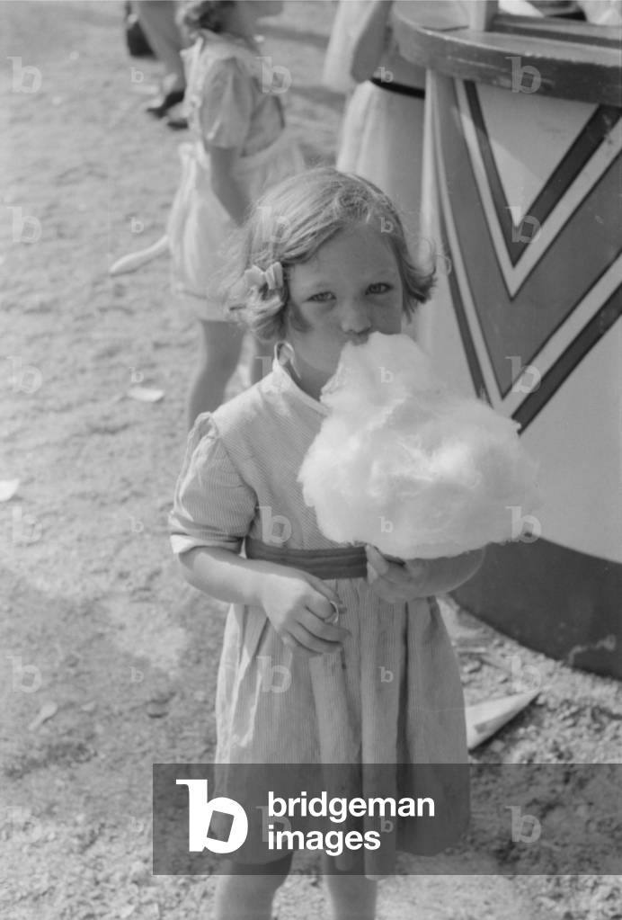 Image of Photography depicting A young girl at the Cotton Carnival in Memphis 1940 by Marion Post Wolcott