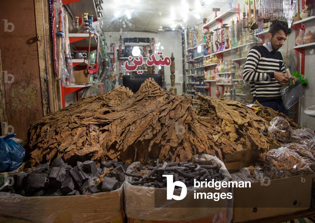 Image of tobacco leaves and waterpipes sold in the bazaar, Hormozgan, Bandar