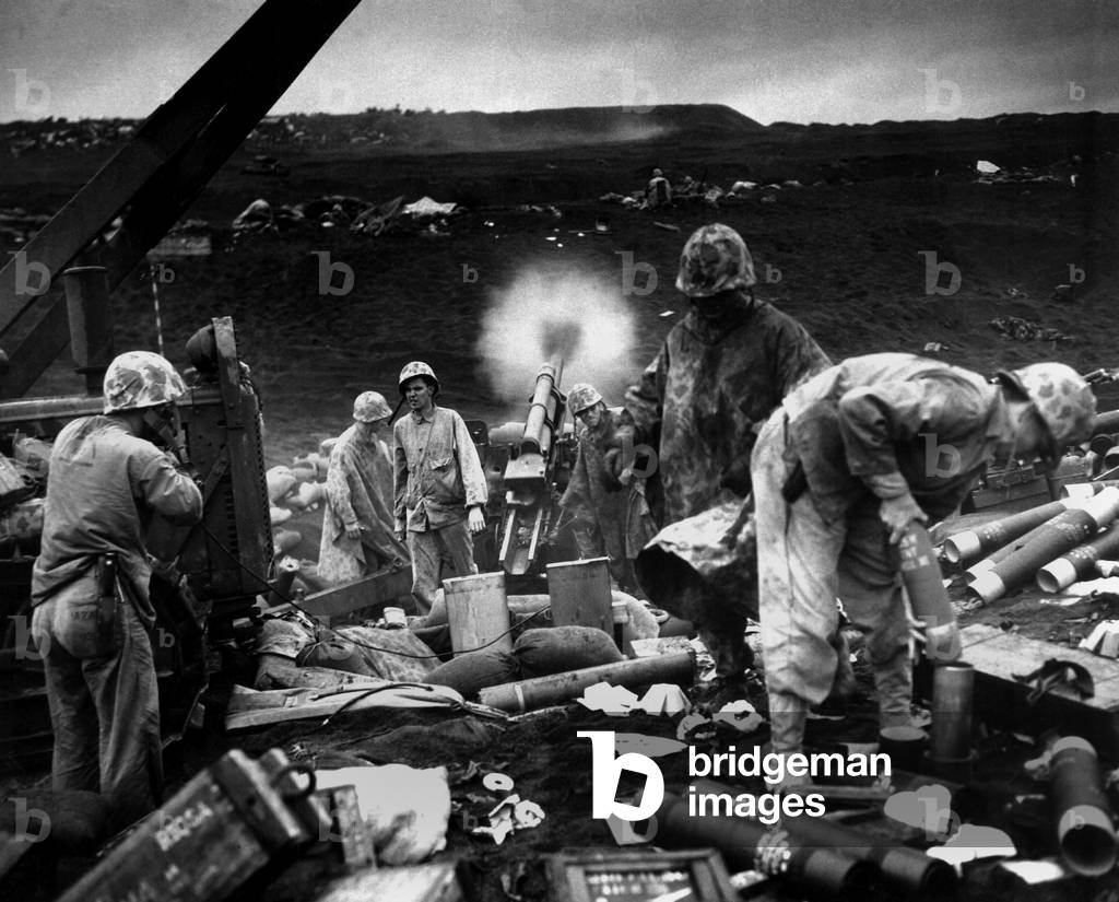 Image of U.S. Marine artillery shells Japanese positions concealed back ...