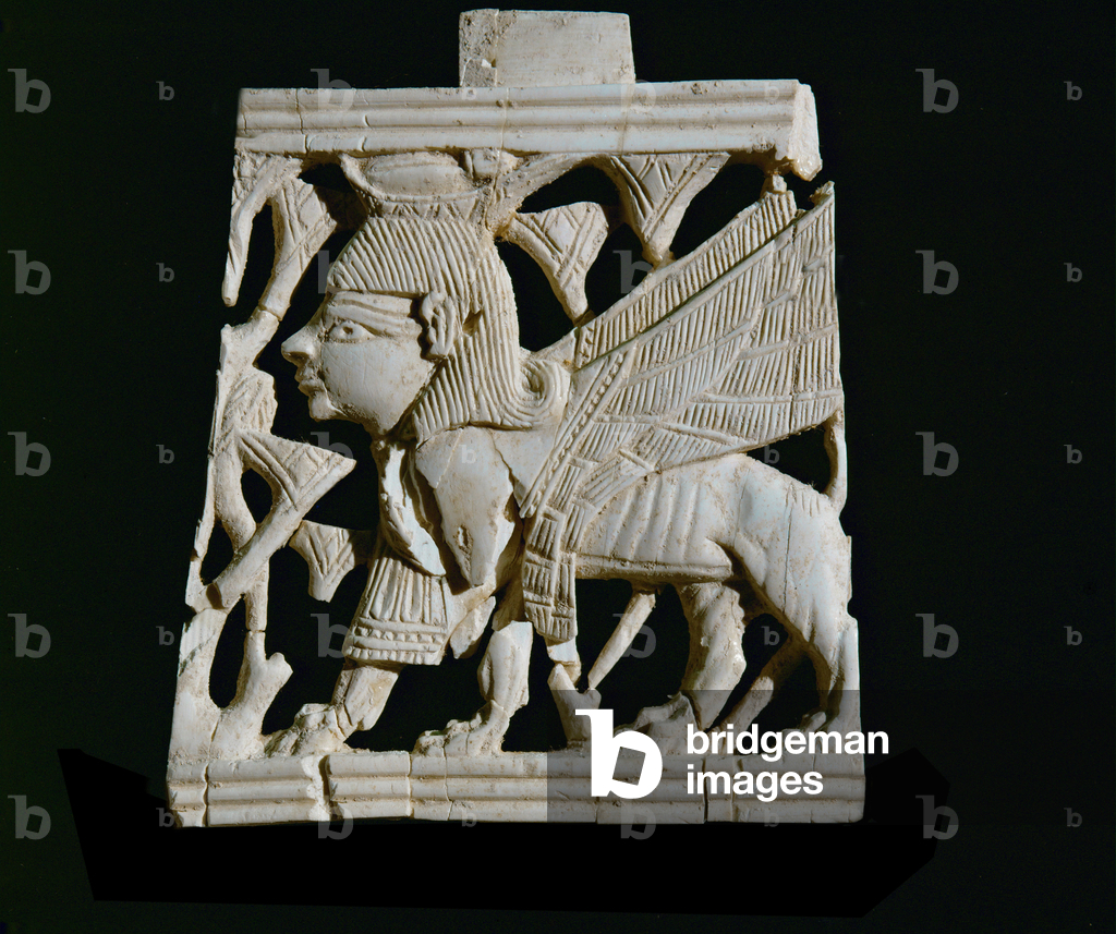 Image of Artifact depicting Winged sphinx in a lotus thicket (ivory) -2000 by Erich Lessing