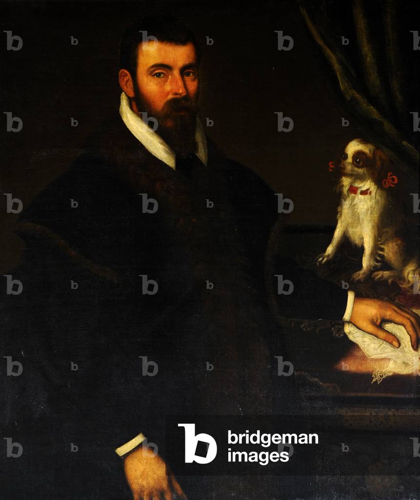 Ein Gentleman mit einem Miniaturspaniel