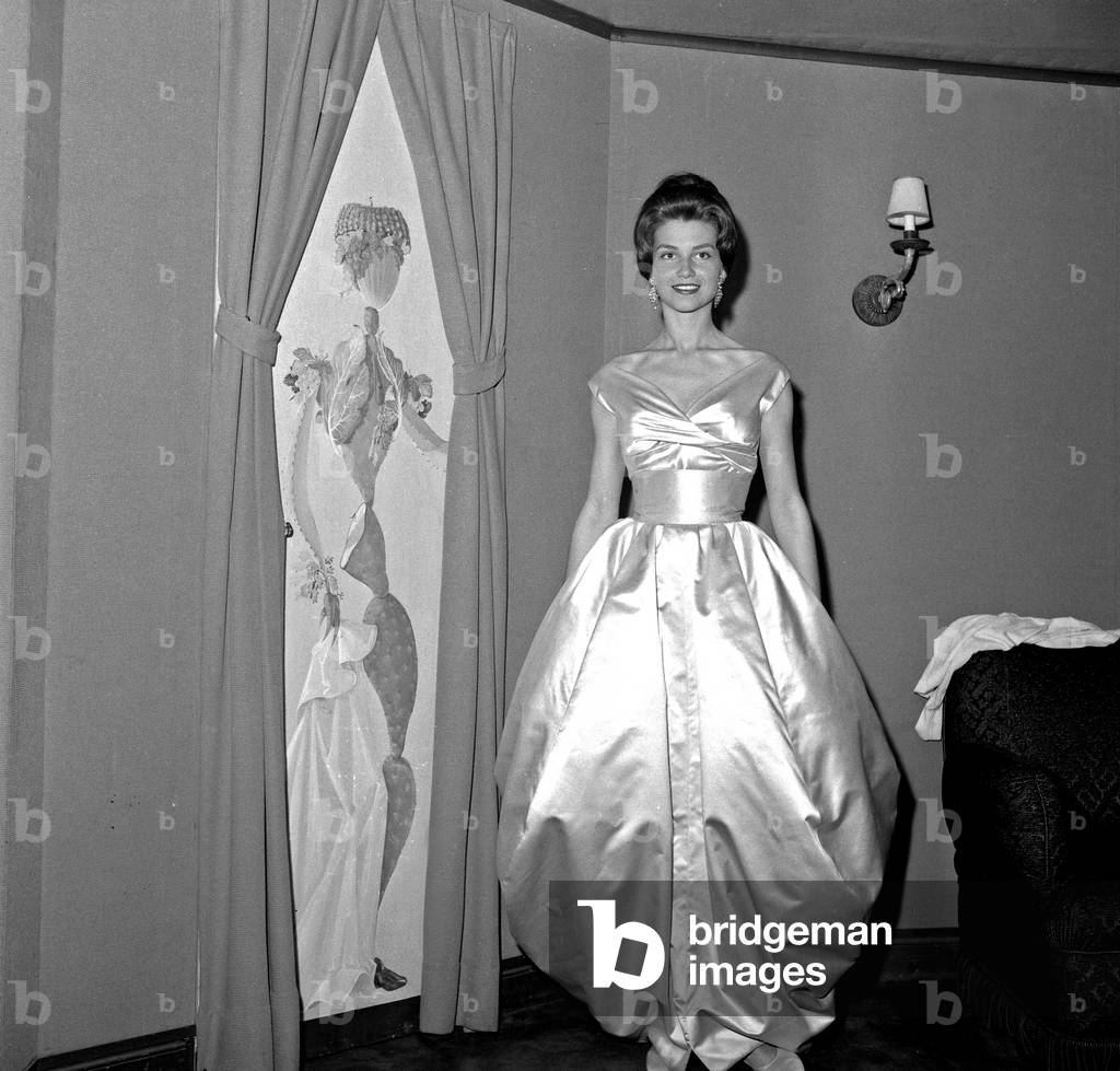 Image of Photography depicting Elizabeth De La Gabbe Wearing her Ball Gown on July 10 1958, b/w