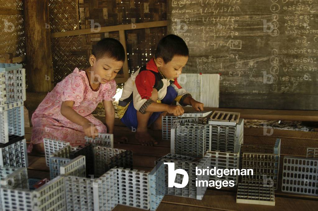 Image of Photography depicting Children play with building blocks in a Pre School run by a Baptist Church in N
