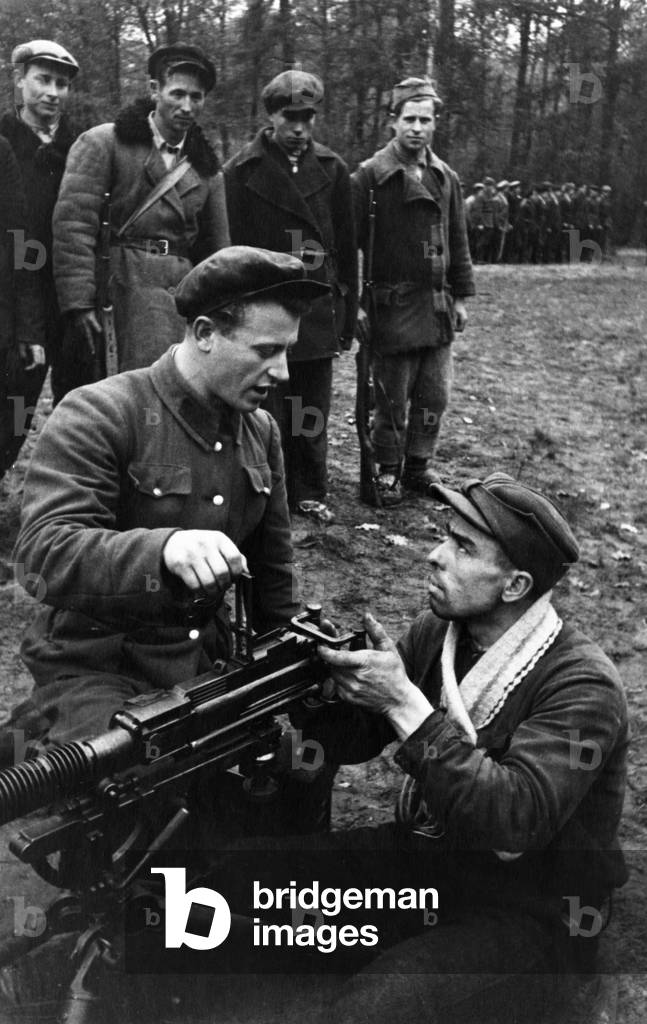 Image of Partisans in Western Byelorussia Being Taught to Fire a Heavy