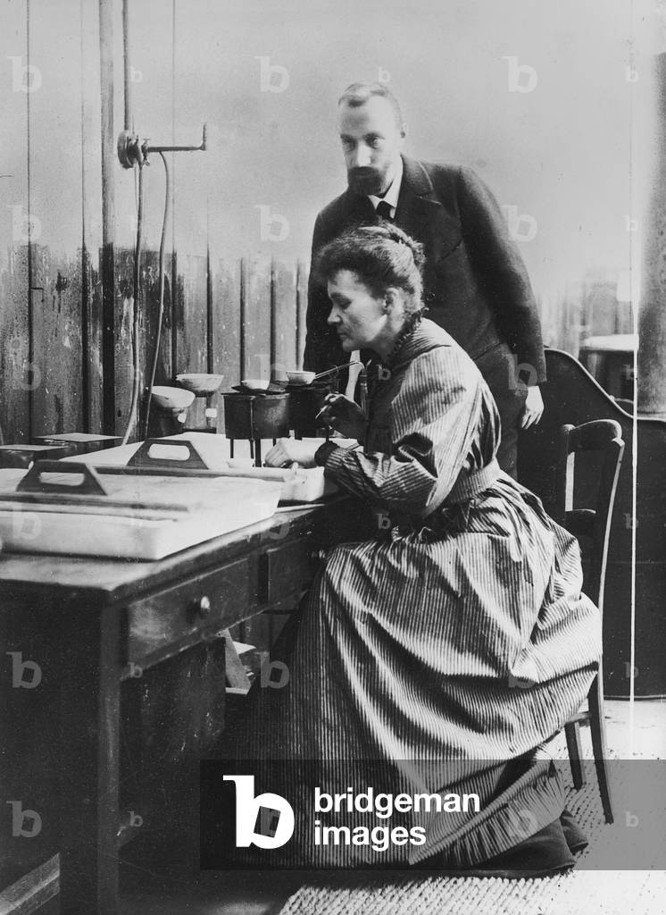 Pierre and Marie Curie in their laboratory in Paris, c.1900 (b/w photo)