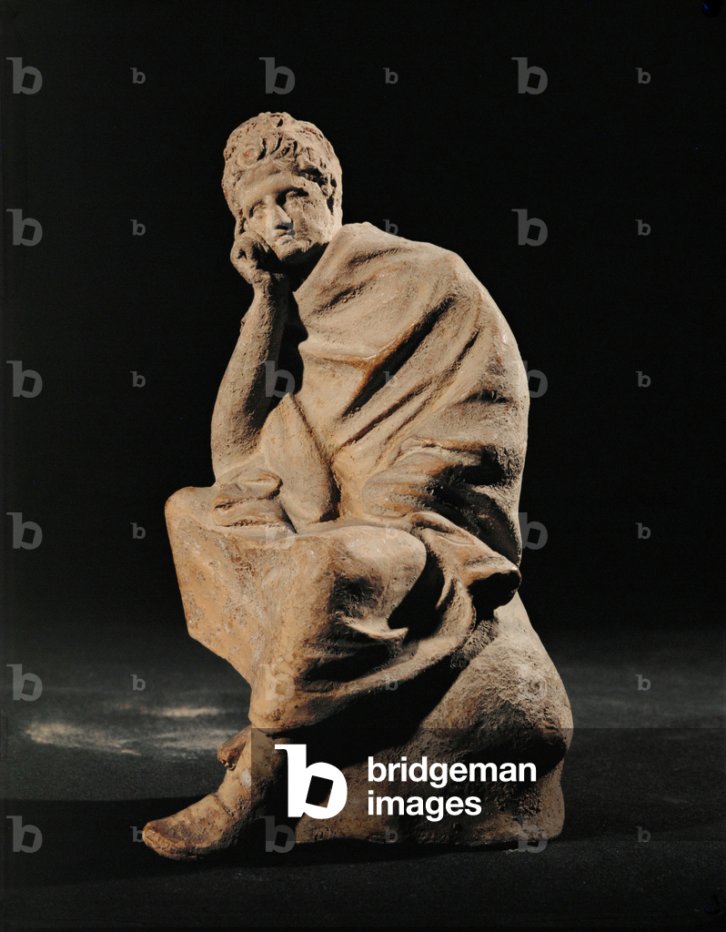Image of Sculpture depicting Ephebe sitting on a rock … by Erich Lessing