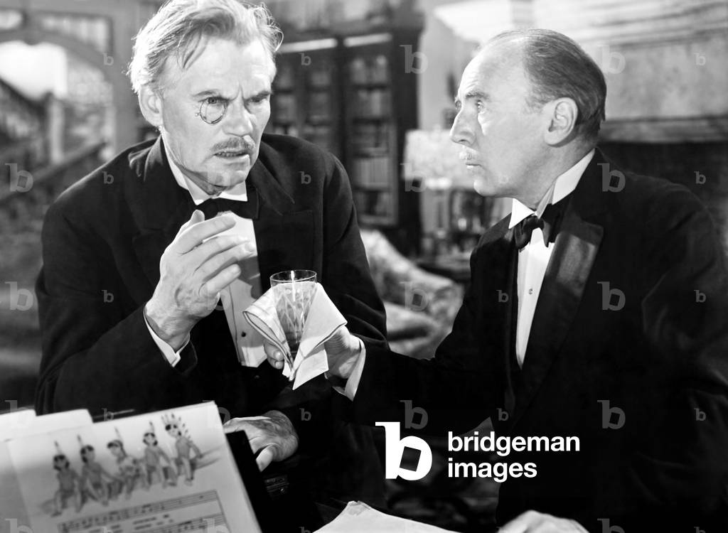 Walter Roland AND THEN THERE WERE NONE, from left, Walter Huston, Roland Young, 1945 by