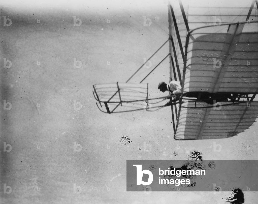 WRIGHT BROTHERS GLIDER Orville Wright in the sophisticated biplane