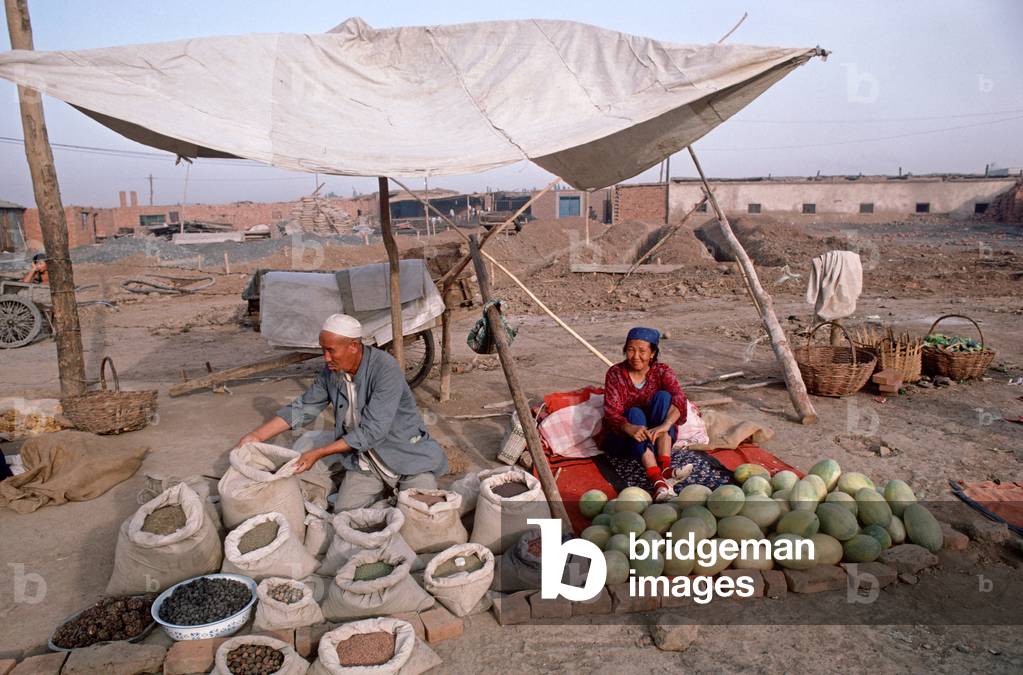 "Uyghurs che vendono meloni"
