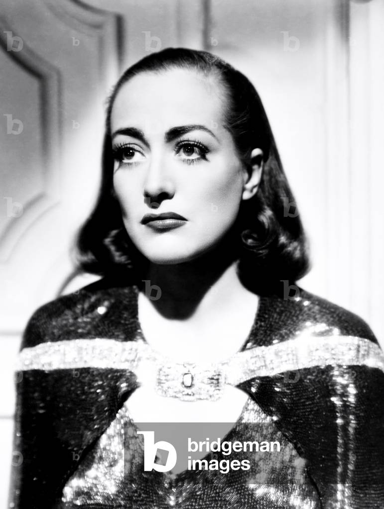 THE BRIDE WORE RED, Joan Crawford, in a red buglebeaded dress by