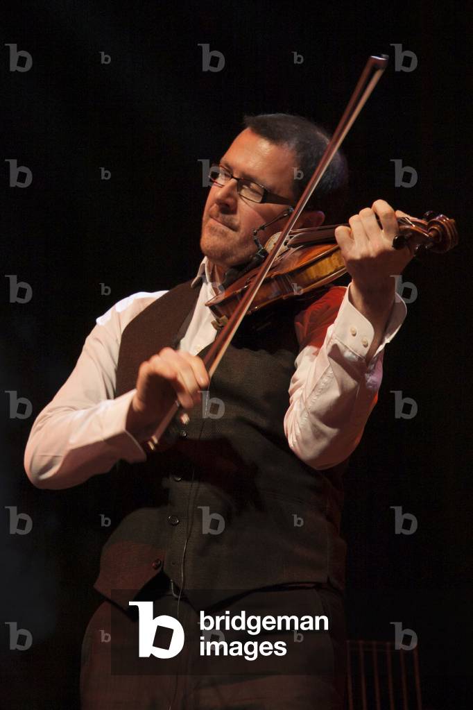 Immagine di Fotografia "Chris Stout violinista al concerto Celtic Connections 2013 20th Celebration" di Paulin