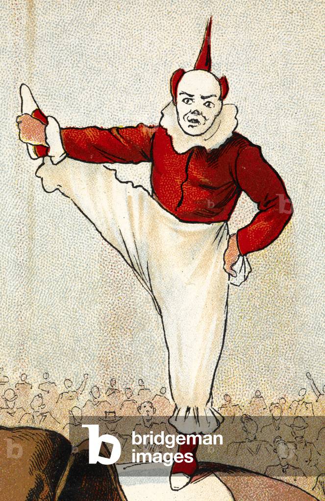 Un clown debout sur une jambe.