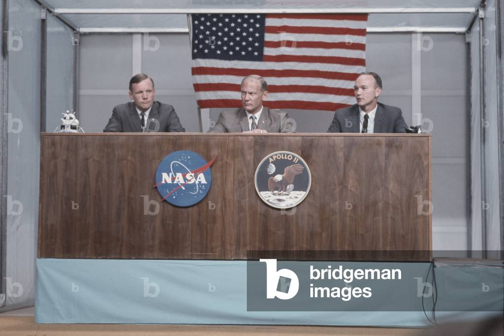 Neil Armstrong Buzz Aldrin and Michael Collins in a press conference