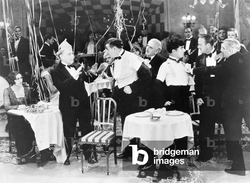 CHARLIE CHAPLIN CITY LIGHTS Charlie Chaplin in a scene from the film 'City Lights,' with Harry