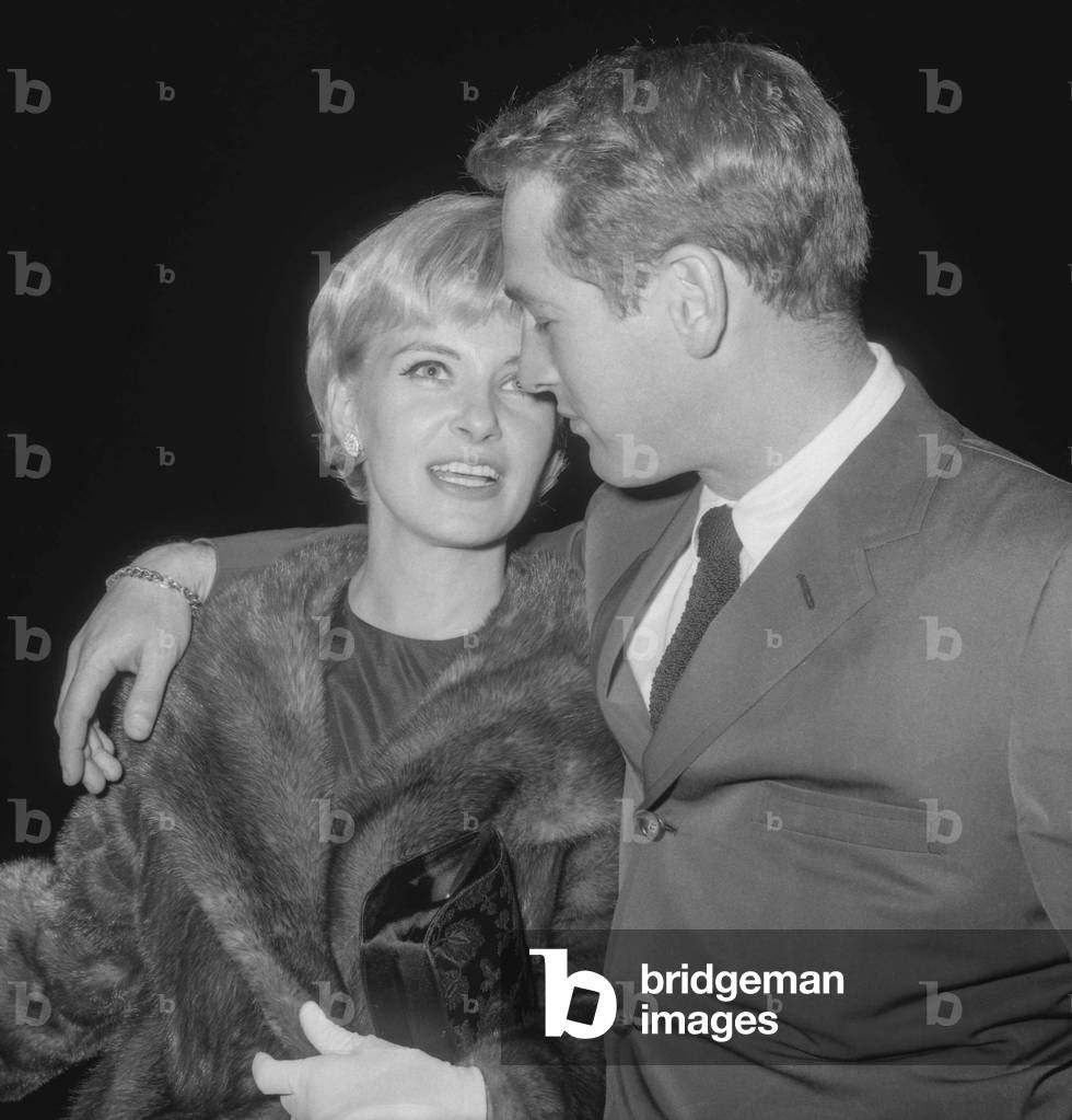 Image of Paul Newman and his wife Joanne Woodward arriving at a