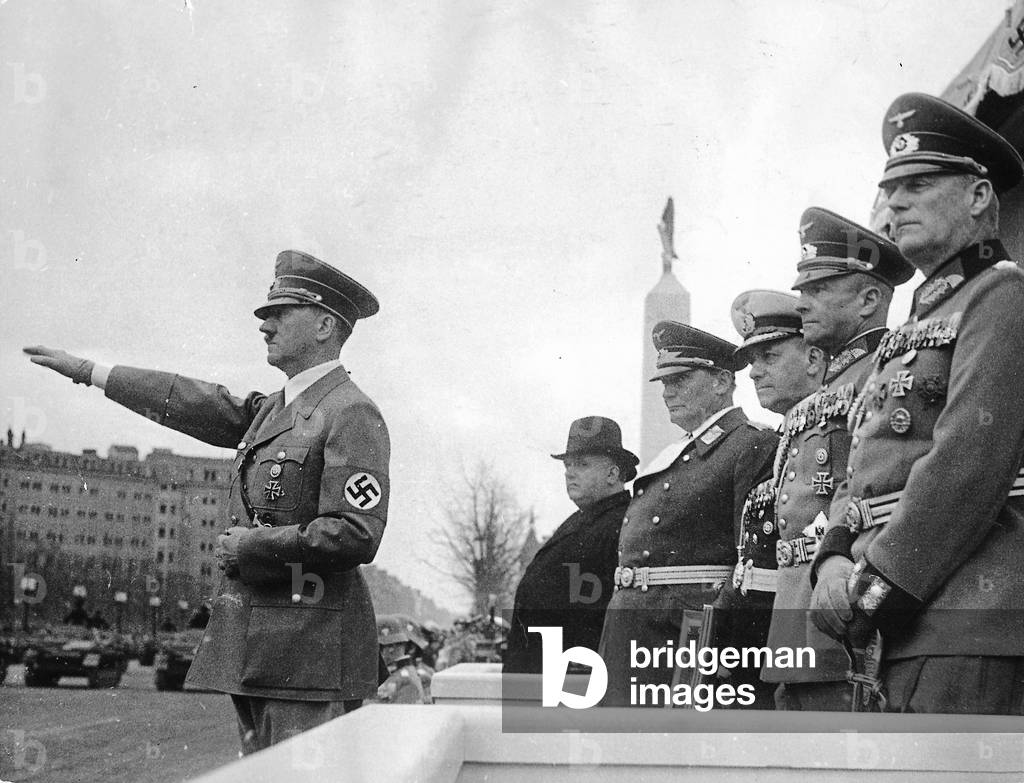 Adolf Hitler salutes marching troops of the Wehrmacht at the parade on the occasion of his birthday, Berlin, 1