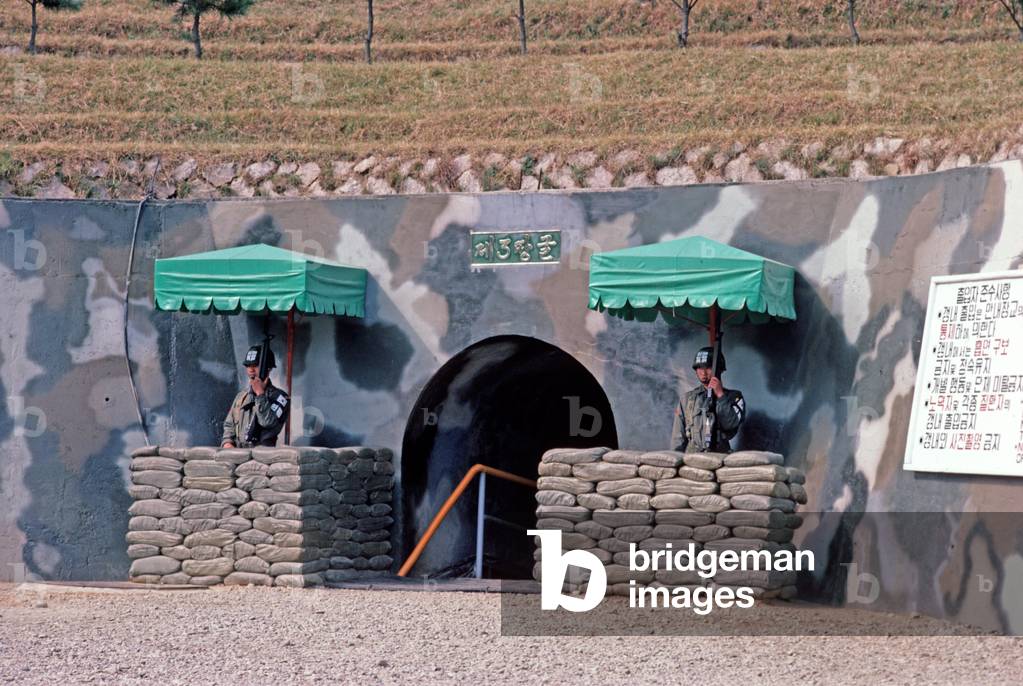 South Koreans guarding entrance to tunnels built by North by