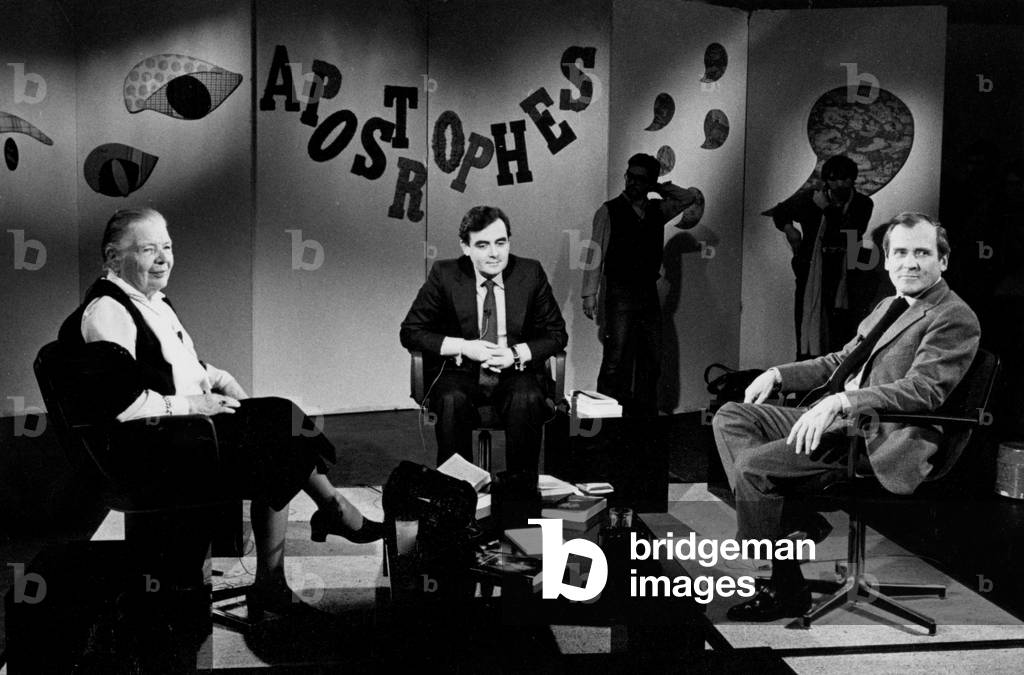 tvhost Bernard Pivot with guests, writers Marguerite Yourcenar and Jean d'Ormesson, during tv program in Janua