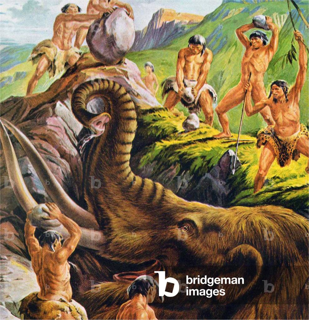 Pre-historic cavemen hunt a Mastodon