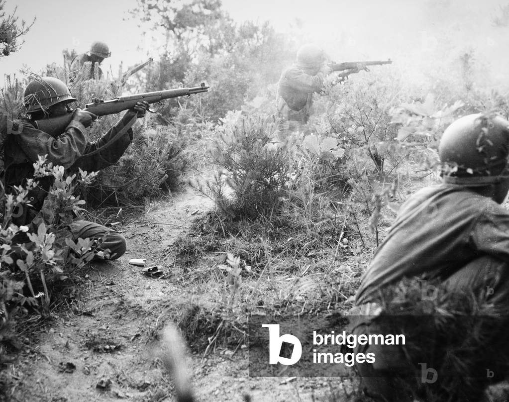 KOREAN WAR MOCK BATTLE Soldiers of the 5th RCT, U.S. 24th Infantry