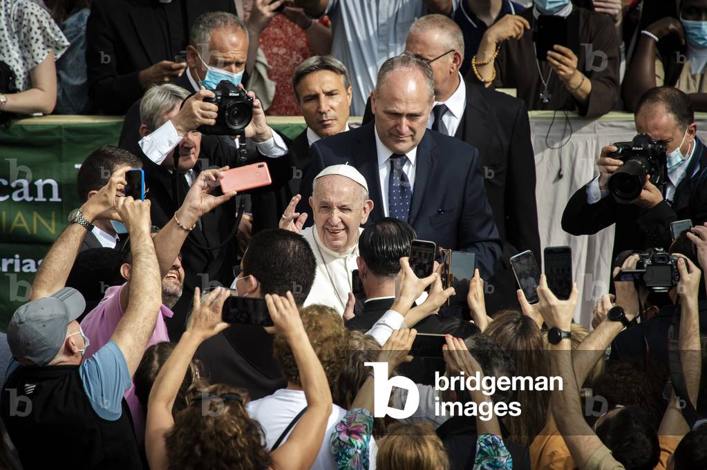 Image of Photography depicting Pope Francis meets faithfuls at the end of a limited public audience at the San