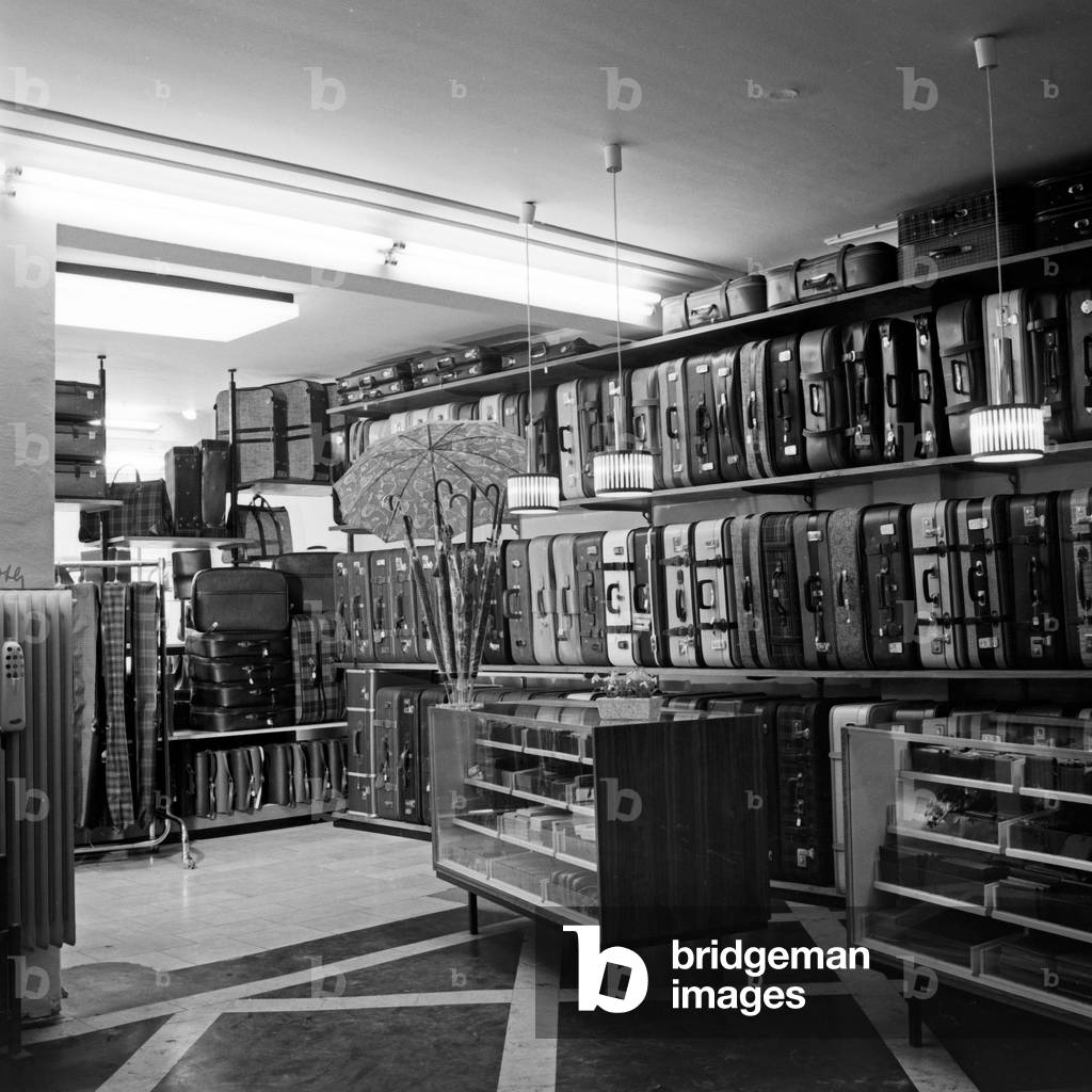 Image of Filled shelving at a leather and bag store in Hamburg,