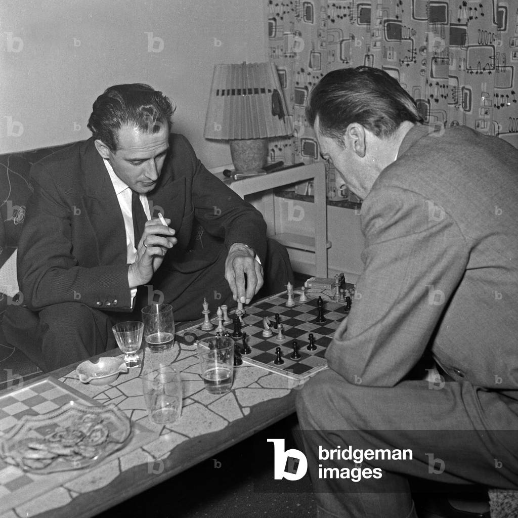 Two men playing chess, b/w