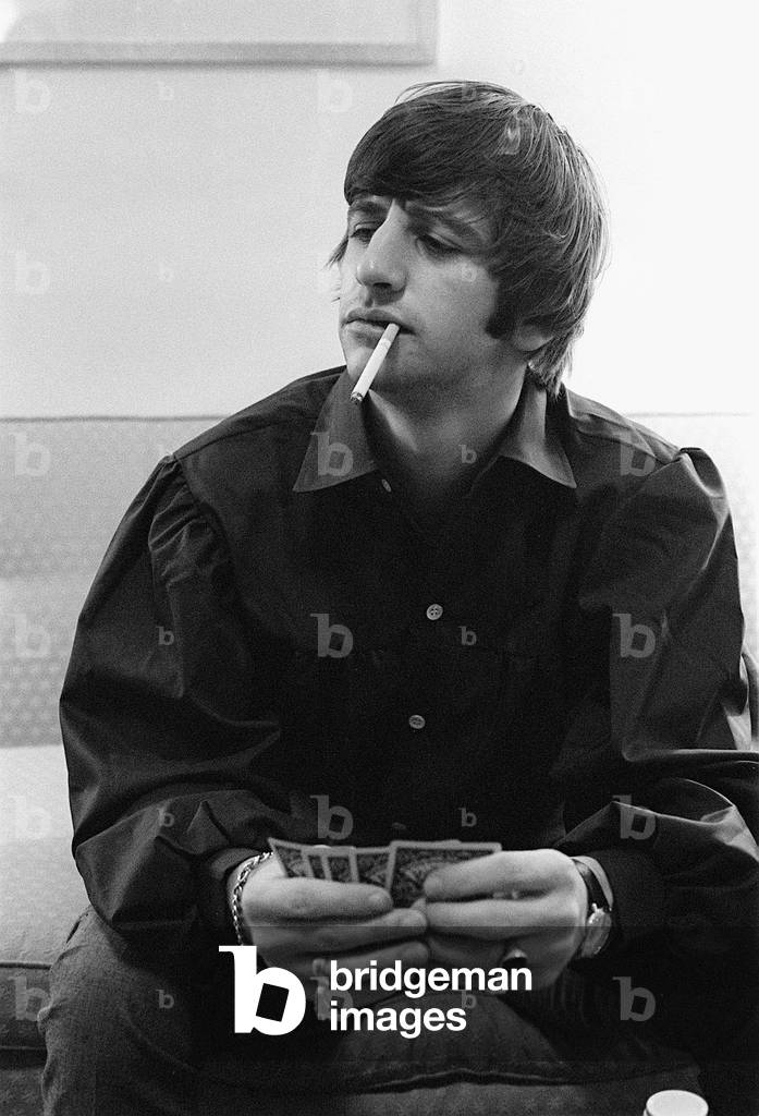 beatles cigarette cards Image of Ringo Starr playing cards at rented Bel Air home during