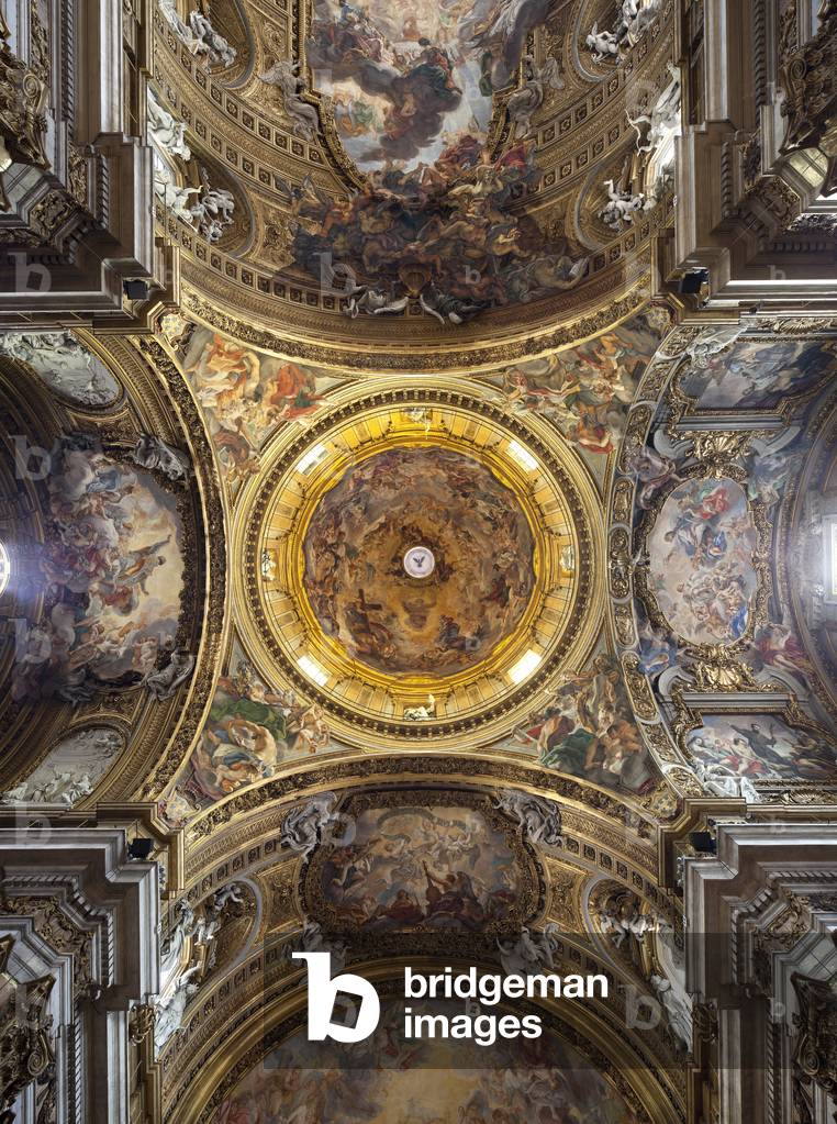 View of the dome of the church of Gesu (chiesa del Gesu) in Rome, the main church of the company of Jesus founded by Ignatius of Loyola (1491-1556), The dome designed by Giacomo della Porta (1533-1602) and decoree of the fresco depicting the apparition of paradise in Jesus by Giovanni Battista Gaulli dit Il Bacicsta Cio (1639-1709), who made the name of Jesus (Il Trionfo del nome di Gesu) fresco in trompe l'oeil on the central vault, Art de la Contre Reforme, Italian Baroque religious architecture dating from the 16th century. Photography, KIM Youngtae, Rome, Lazio, Italy.