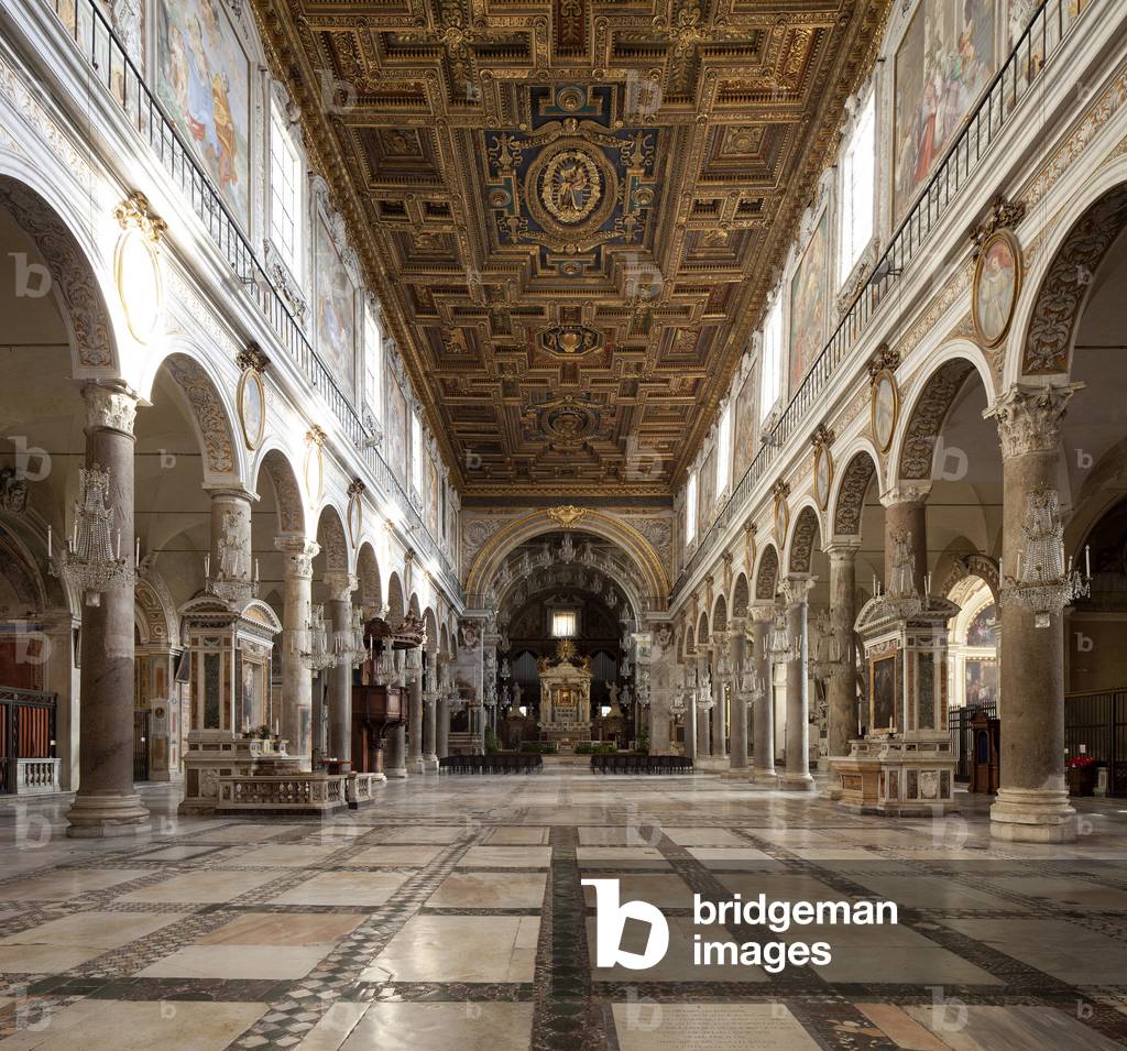 Central nave of the Basilica of Santa Maria in Aracoeli (Santa Maria in Aracoeli), Italian religious architecture, Church founded in the 6th century, located in the Capitol in Rome, given in 1250 to the Franciscan order by Pope Innocent IV, The floor in cosmatesque pavement, Ceiling in wooden boxes painted in 1575 to celebrate the victory of Lepanto in 1571. Photography, KIM Youngtae, Rome, Lazio, Italy.