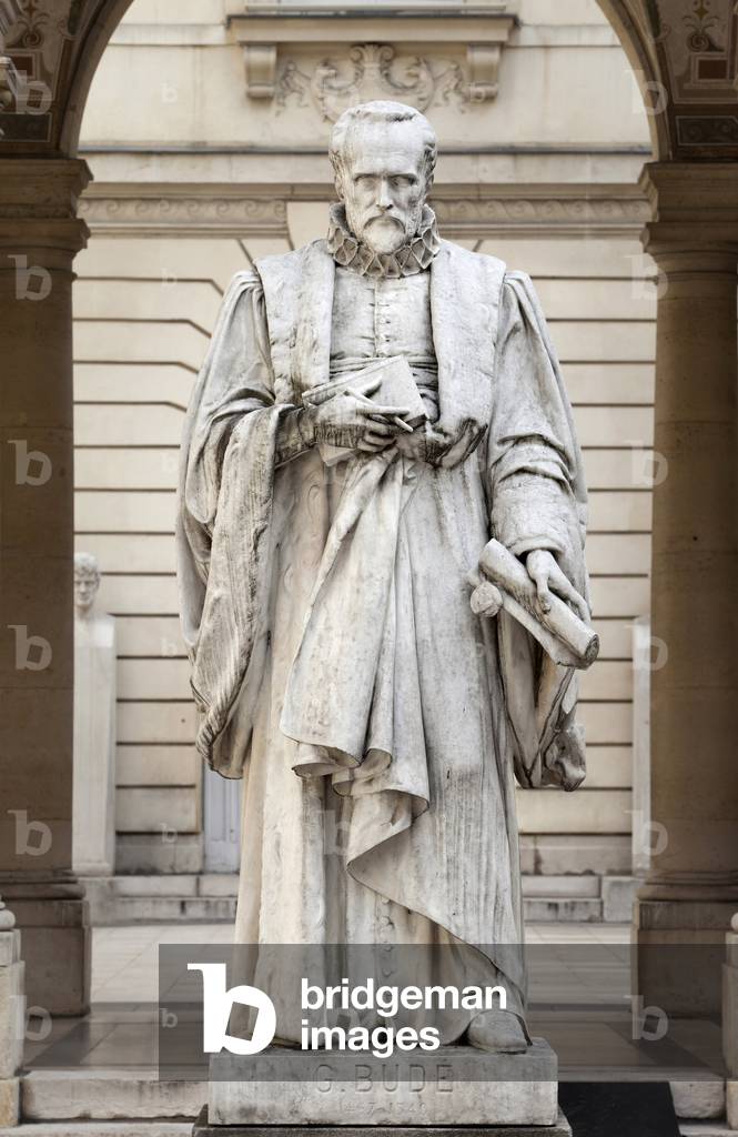 Statue of Guillaume Bude (Budee) (Budaeus) (1467-1540), French humanist, responsible for the royal library of Fontainebleau under the reignation of Francois 1st, instigator of the creation of the College of Royal Readers in 1530, future College of France, marble sculpture of Urbain Bourgeois (1842-1911), dating from 1883, installed at the College of France., Paris.