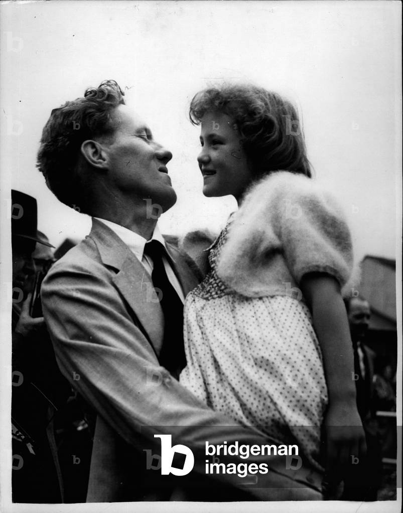 Jul 07, 1953 - The British Everest team return to London. The medical man of the party. The Victorious British Everest team arrived at London airport this afternoon at the end of their journey from India