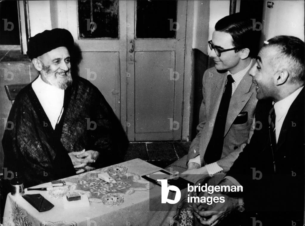 Tue 03, 1953 - German Reporter Visits Mossadequk's opponent. The Munich journalist Joerg A. visited Ayatollah Zashani, chief of the schiite and president of the Iranian House of Representatives. The 82 year old man is said to be the” Strong Man” of Iran who is leading the fate of his country from the background. During the last crisis he placed him self at the side of the Shah as Mossadequ seemed him to be to be powerful and autocratic. Now Kashani refused again to convoke the parliament from which Mossadequ expects to get the vote of confidence. His political confession as he told to our reporter is “Everything occuring here is the fault of the English!” Our Picture Show: Kashani, Elten and the interpreter, Alizadeh.