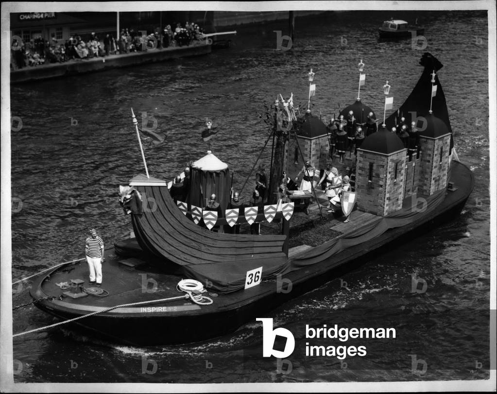 Jul 07, 1953 - 07Royal Cornation Pageant On The Thamee. “Signing Of The Mauna Carta”: Photo Shows the Tablean representing” King John and Signing of the Magna Carts” - at Runnymade - 1215 - during the Royal Cornation Pageant on the Themese as seen Hungerford Bridge this morning.