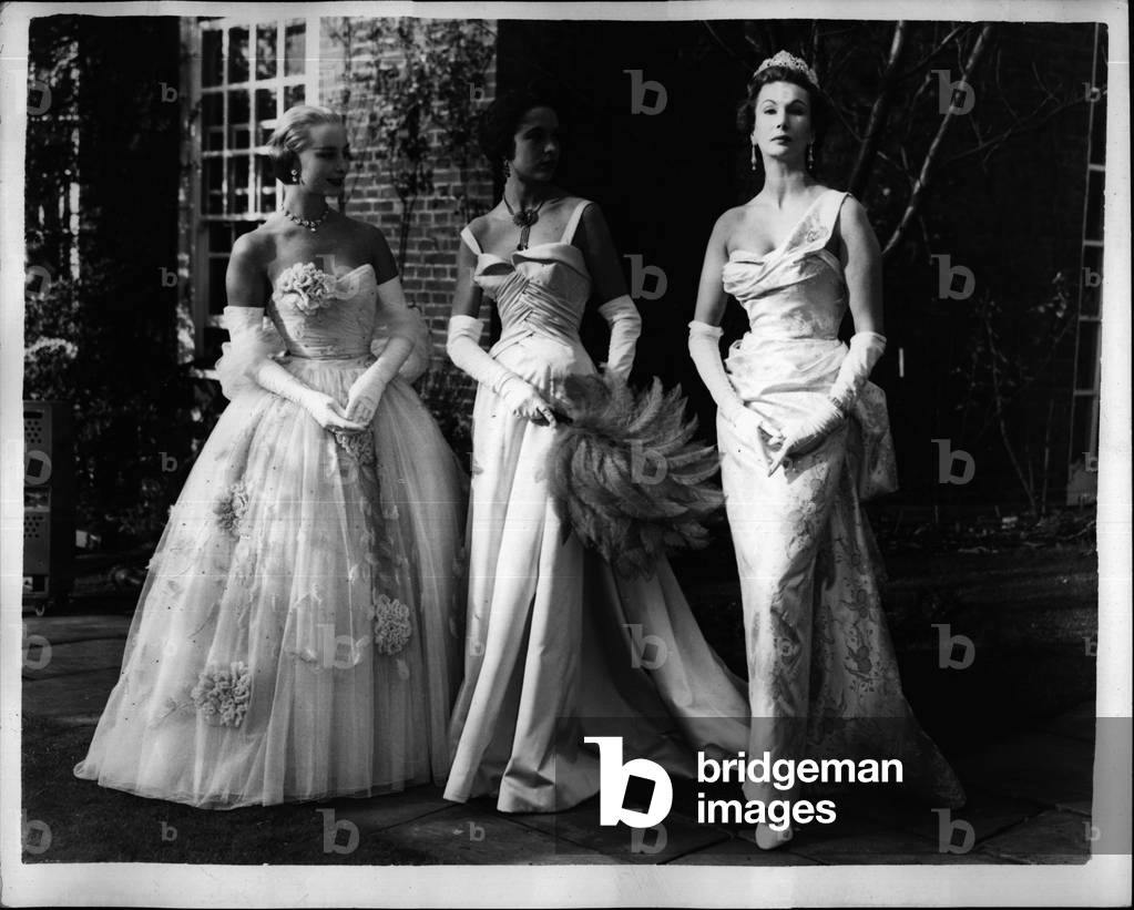 Nov. 11, 1953 - Models model clothes for Royal Dress Show; 40 Models are today showing British Fashions to the Queen mother. They will wear clothes of he top ten teh incorporated Society of British fashion designers and are showing them at the home of Lady Clark, the Society's President