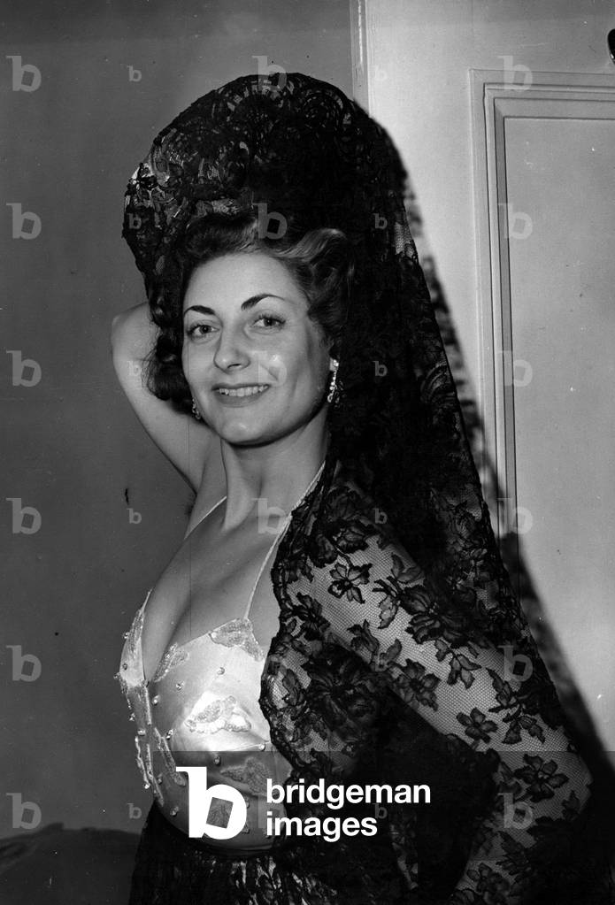 Nov. 11, 1954 - Marika Marjore- Italian singer and favorite of fraces to star in London Cabaret at Oddenino's: Photo shows Marika Marjore who arrived in London yesterday seen in her costume at the hotel room this afternoon