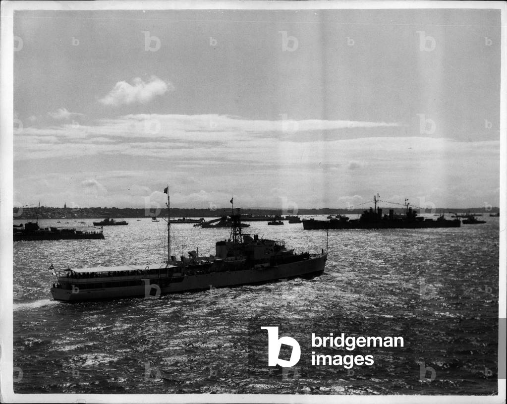 Jun 06, 1953 - Review silhouette: Portsmouth: The Despatch Vessel Surprise, acting as Royal Yacht, is silhouetted against sparkling waves as she steams past the smaller vessels taking part in today's Review of the Fleet by the Queen. The Queen and Duke of Edinburgh viewed the assembled ships from the small glass structure, forward of the bridge