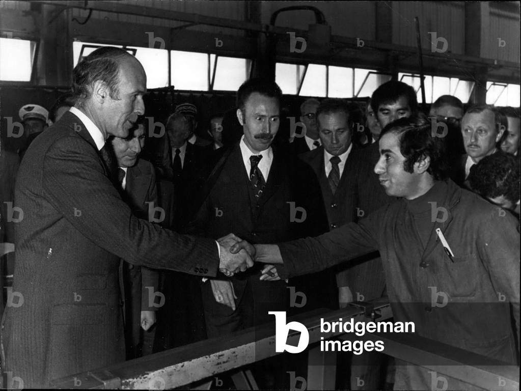 Apr. 12, 1975 - During his brief visit to Algeria, President Giscard d'Estaing (France) completed the traditional visit to the Rouiba Industrial Complex, a factory that came from Berliet in 1970 to the Algerian Mechanical Construction Company. Boumedienne is the President of Algeria