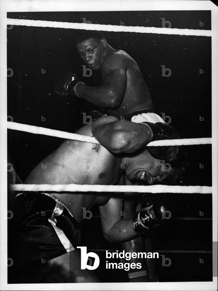 Nov. 11, 1953 - Nino Valdes, Cuba, beats European Champion Heinz Neuhaus, Germany, by k.o in the 4th round. The fight took place in the Westfalenhalle in Dortmund, Germany.