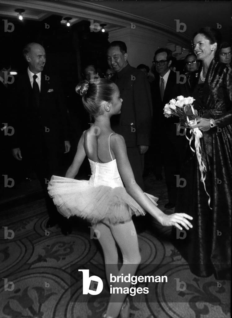 Oct. 18, 1979 - The President of China Hua Guofeng attended a gala in his honor at the Paris Opera. Here is President Valery Giscard d'Estaing being welcomed by a little ballerina at the opera